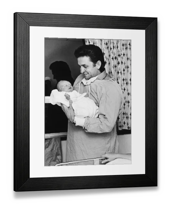 Framed Print : Johnny Cash Holding Newborn Son Framed Print : Johnny Cash Holding Newborn Son
