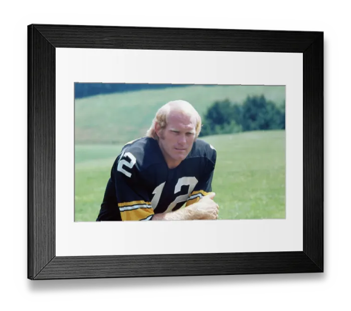 Framed Print : Football Player Kneeling on Grassy Field Framed Print : Football Player Kneeling on Grassy Field