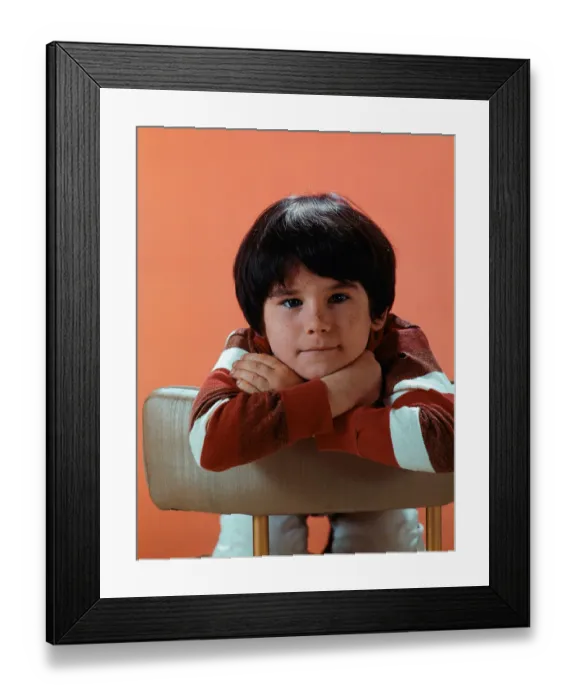 Framed Print : Young Actor Brandon Cruz Backwards in Chair Framed Print : Young Actor Brandon Cruz Backwards in Chair