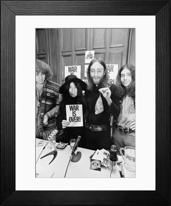 Framed Print : John Lennon and Yoko Ono with War Is Over Sign Framed Print : John Lennon and Yoko Ono with War Is Over Sign