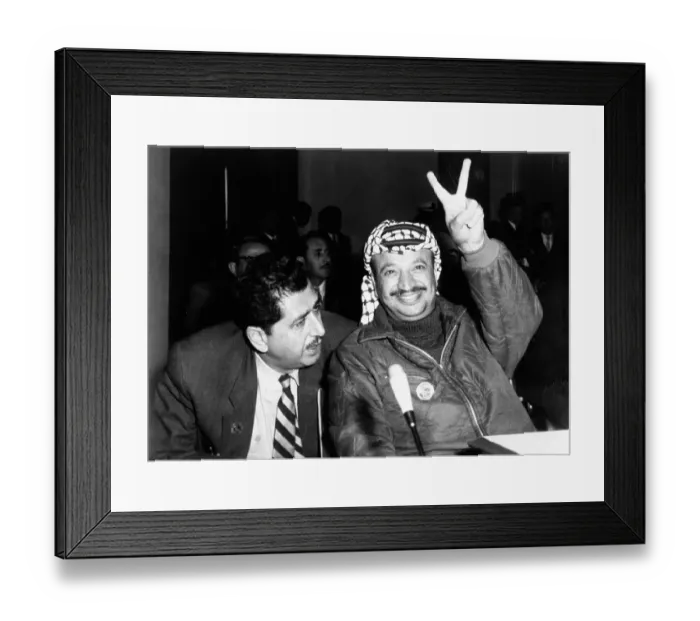 Framed Print : Yasser Arafat Giving Victory Sign Framed Print : Yasser Arafat Giving Victory Sign