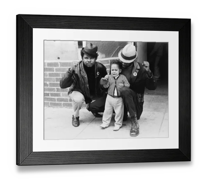 Framed Print : Toddler and Men Giving Black Panther Salute Framed Print : Toddler and Men Giving Black Panther Salute