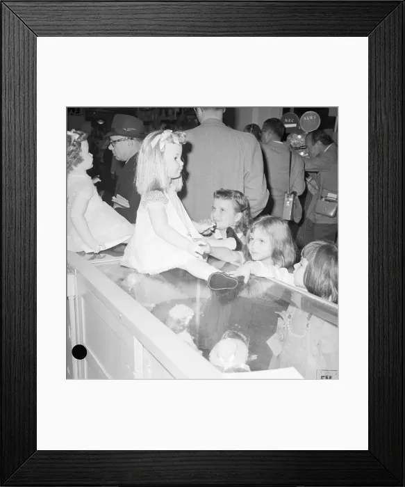 Framed Print : Orphans Looking at Dolls at Macy's Framed Print : Orphans Looking at Dolls at Macy's