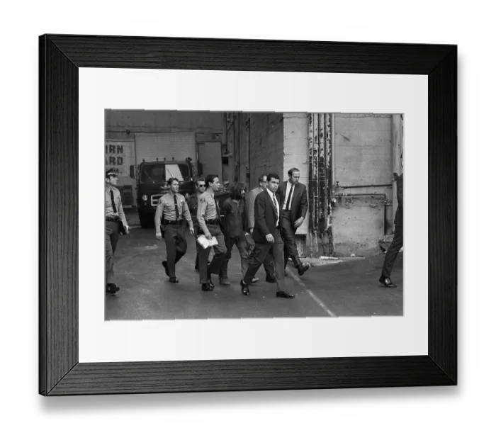Framed Print : Charles Manson Led Away After Arraignment