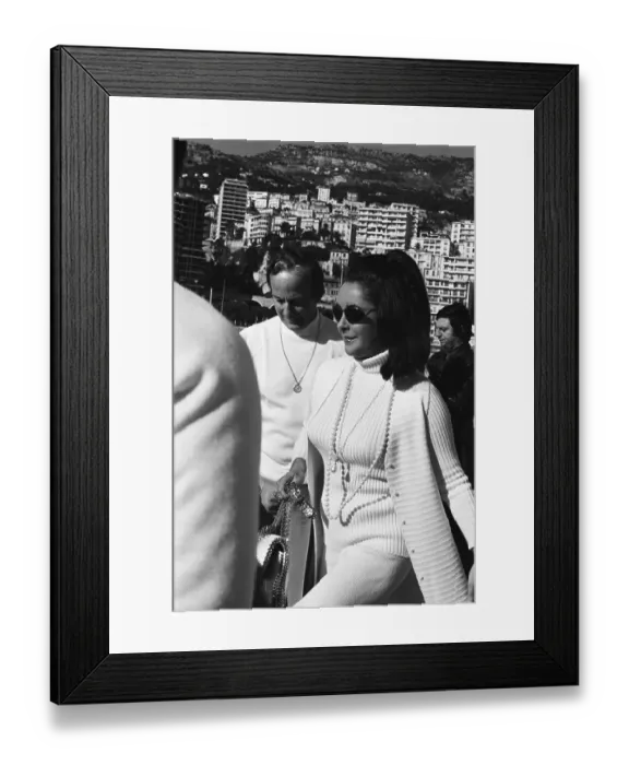 Framed Print : Liz Taylor in Sunglasses Walks with Men Framed Print : Liz Taylor in Sunglasses Walks with Men