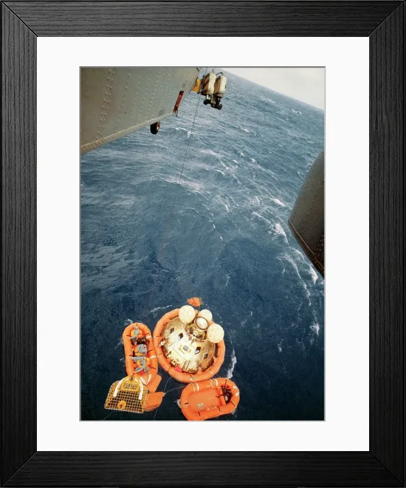 Framed Print : Helicopter Lowering Rescue Net to Astronauts