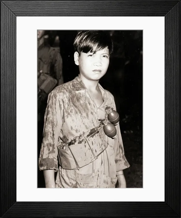 Framed Print : Vietnamese Boy Soldier with Grenades Framed Print : Vietnamese Boy Soldier with Grenades