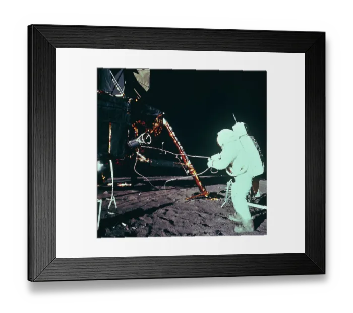 Framed Print : Astronaut Working with Equipment on Moon Surface Framed Print : Astronaut Working with Equipment on Moon Surface