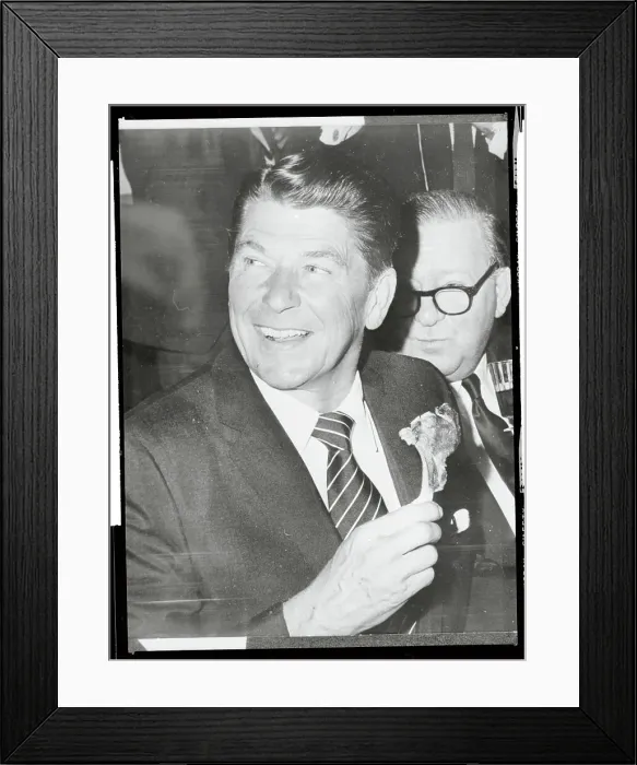 Framed Print : Ronald Reagan Holding a Lamb Chop Framed Print : Ronald Reagan Holding a Lamb Chop