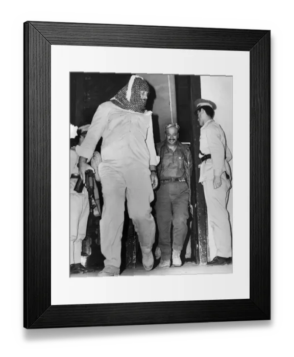 Framed Print : Yasser Arafat Leaves Building with Bodyguard Framed Print : Yasser Arafat Leaves Building with Bodyguard