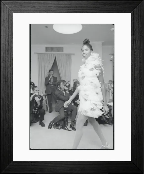 Framed Print : Model Whisks By Audience All In Feathers Framed Print : Model Whisks By Audience All In Feathers