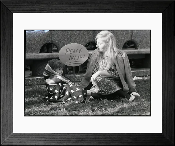 Framed Print : Son in US Flag Sits with Mother on Ground