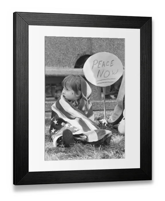 Framed Print : Child Wrapped in Flag Sitting by Peace Sign Framed Print : Child Wrapped in Flag Sitting by Peace Sign