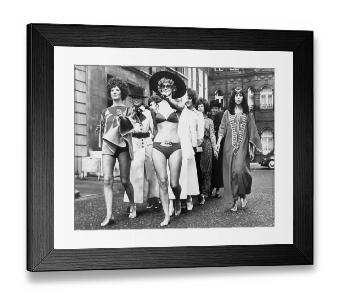 Framed Print : Models Marching Down A Street Framed Print : Models Marching Down A Street