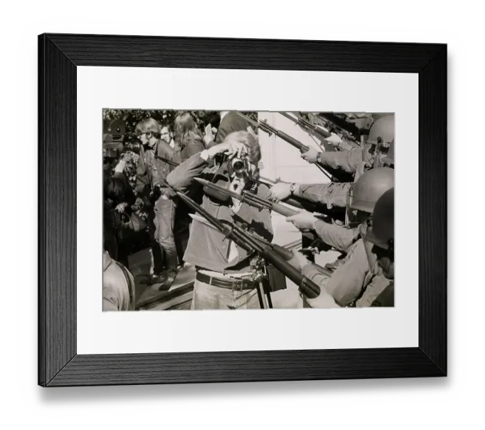 Framed Print : Cameraman Standing Between National Guard Bayonets