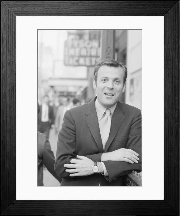 Framed Print : William Goldman near Theater Sign