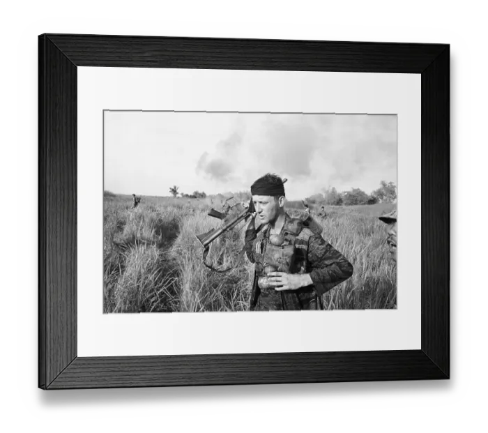 Framed Print : American Soldier Carrying Grenades and Gun Framed Print : American Soldier Carrying Grenades and Gun