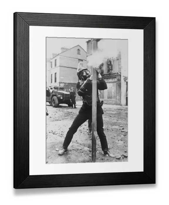 Framed Print : Riot Policeman Firing Tear Gas Shells Framed Print : Riot Policeman Firing Tear Gas Shells