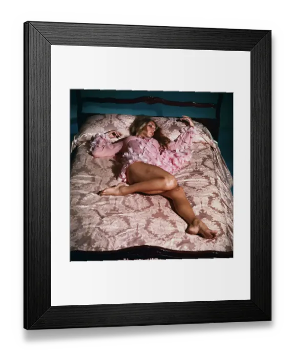 Framed Print : Sharon Tate Posing on a Bed Framed Print : Sharon Tate Posing on a Bed