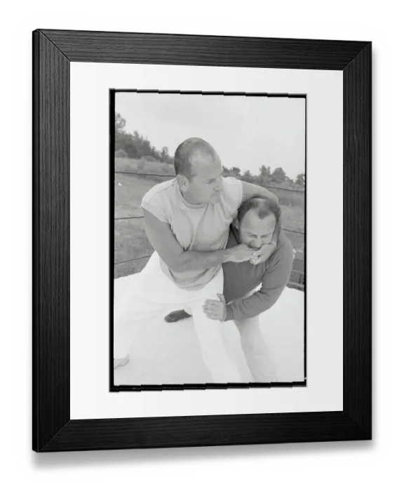 Framed Print : Sam Sheppard Putting Headlock on His Trainer Framed Print : Sam Sheppard Putting Headlock on His Trainer
