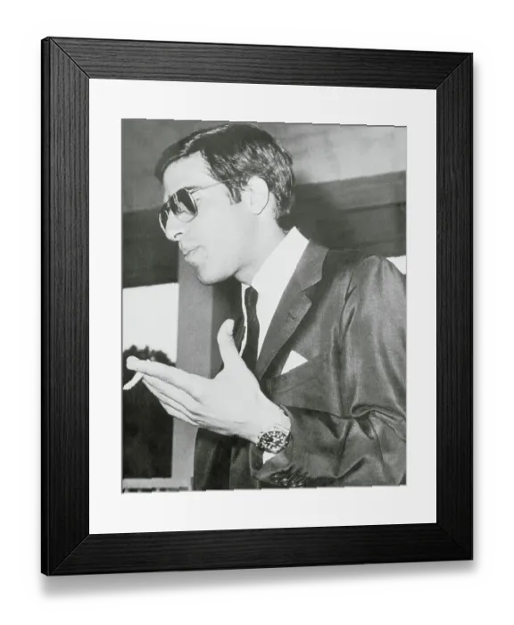 Framed Print : Alexander Onassis Gesturing With Cigarette in Hand