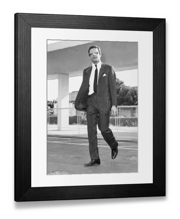 Framed Print : Alexander Onassis Walking Across Lot Framed Print : Alexander Onassis Walking Across Lot