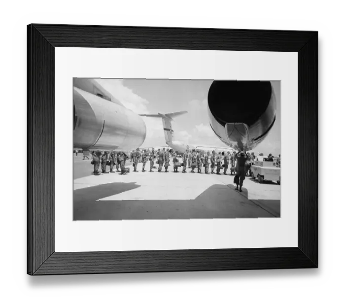 Framed Print : American Troops Boarding A Jet
