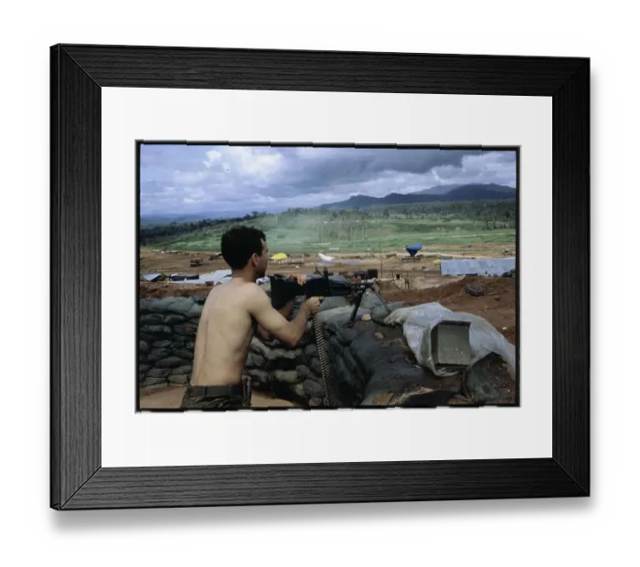 Framed Print : Soldier Holding Machine Gun at Post Framed Print : Soldier Holding Machine Gun at Post