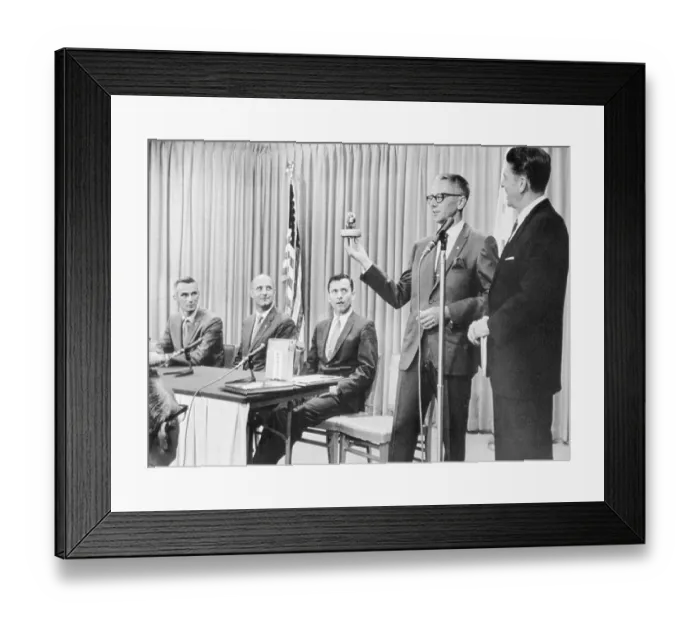 Framed Print : Charles Schulz Holding a Statuette Framed Print : Charles Schulz Holding a Statuette