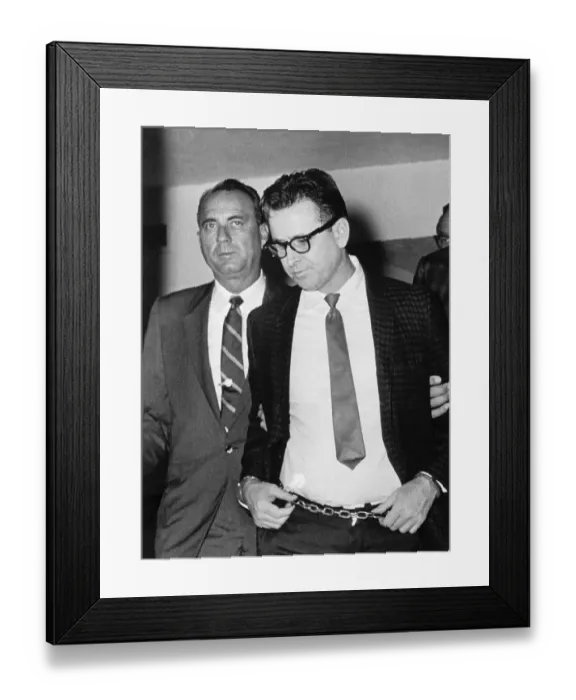 Framed Print : James E. Ray Being Escorted by Officers