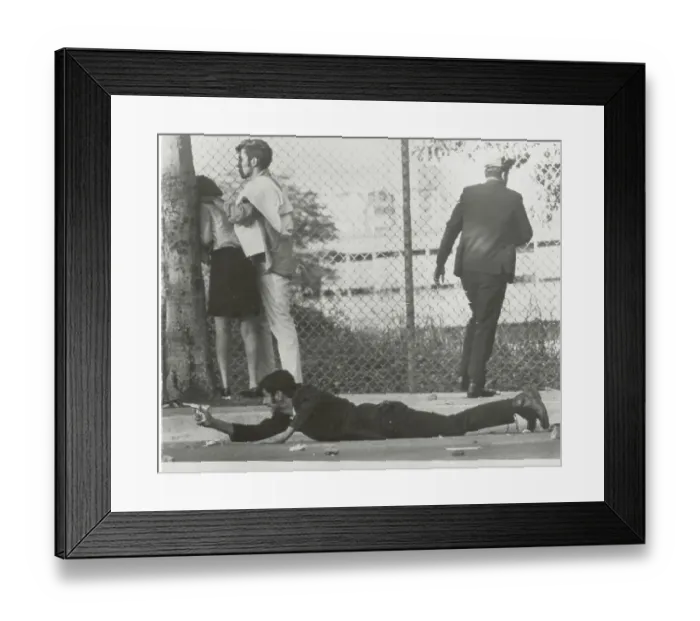 Framed Print : Student Taking Cover on the Ground Framed Print : Student Taking Cover on the Ground