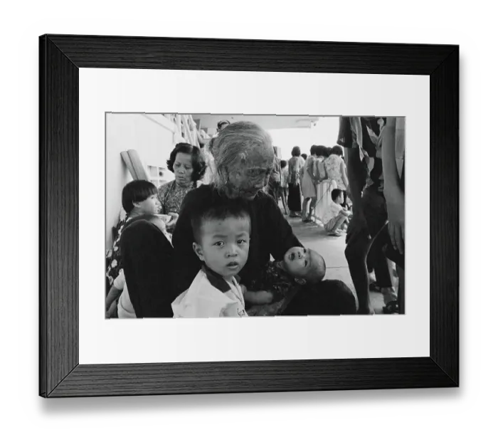 Framed Print : Elderly Woman Comforting Children Framed Print : Elderly Woman Comforting Children