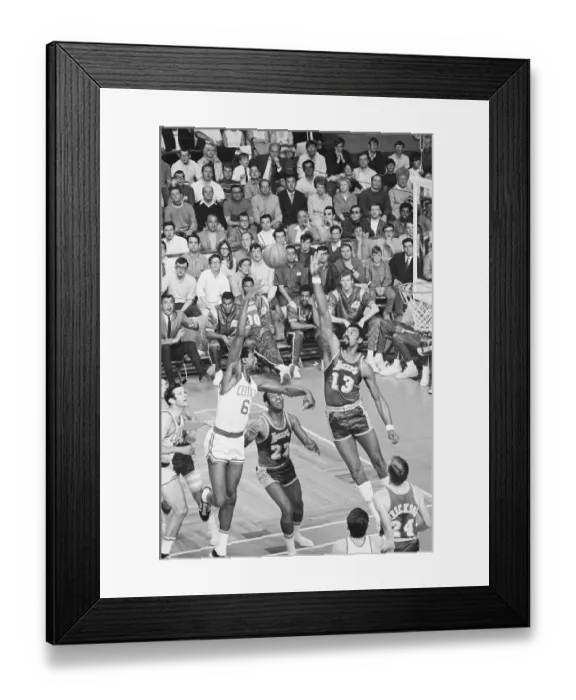 Framed Print : Wilt Chamberlain Jumping to Block Shot