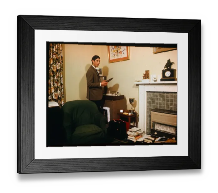 Framed Print : Prince Charles Holding a Record in Hand Framed Print : Prince Charles Holding a Record in Hand