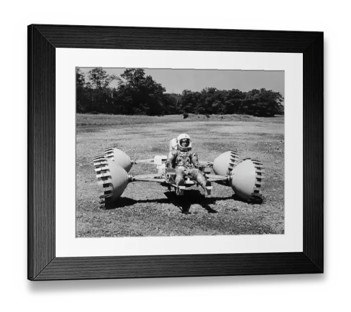 Framed Print : Astronaut Rides on Proposed Lunar Vehicle Framed Print : Astronaut Rides on Proposed Lunar Vehicle
