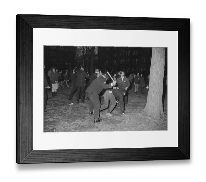 Framed Print : Police Officer Hitting Student at Protest Framed Print : Police Officer Hitting Student at Protest