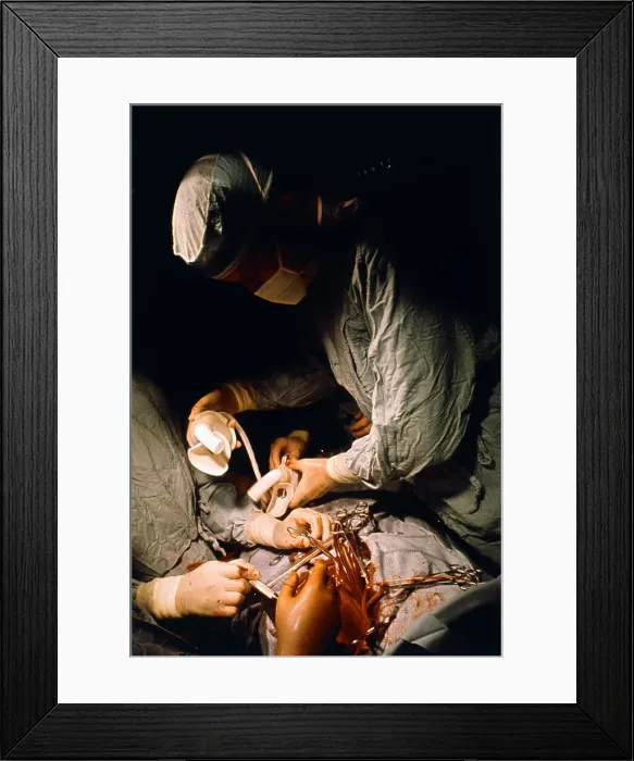 Framed Print : Doctors Perform a Mechanical Heart Transplant Framed Print : Doctors Perform a Mechanical Heart Transplant