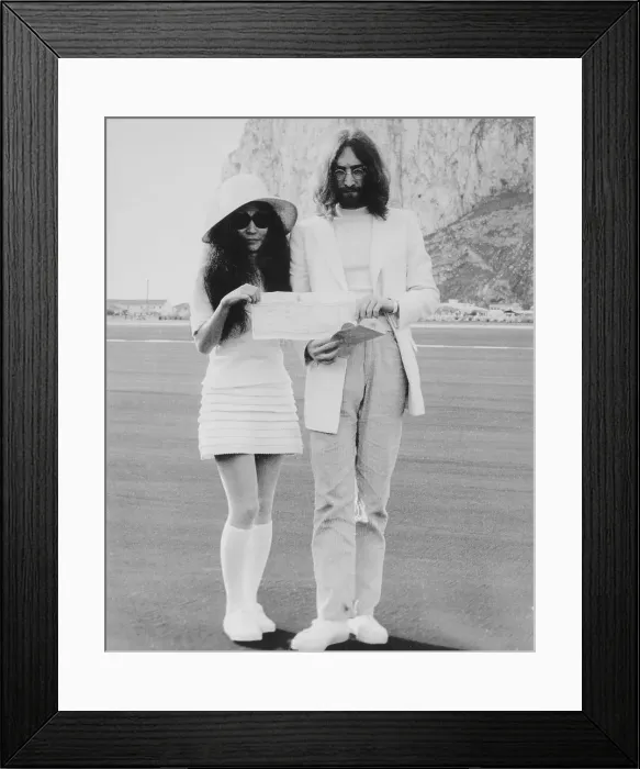 Framed Print : John Lennon and Yoko Ono Holding Marriage Certificate Framed Print : John Lennon and Yoko Ono Holding Marriage Certificate