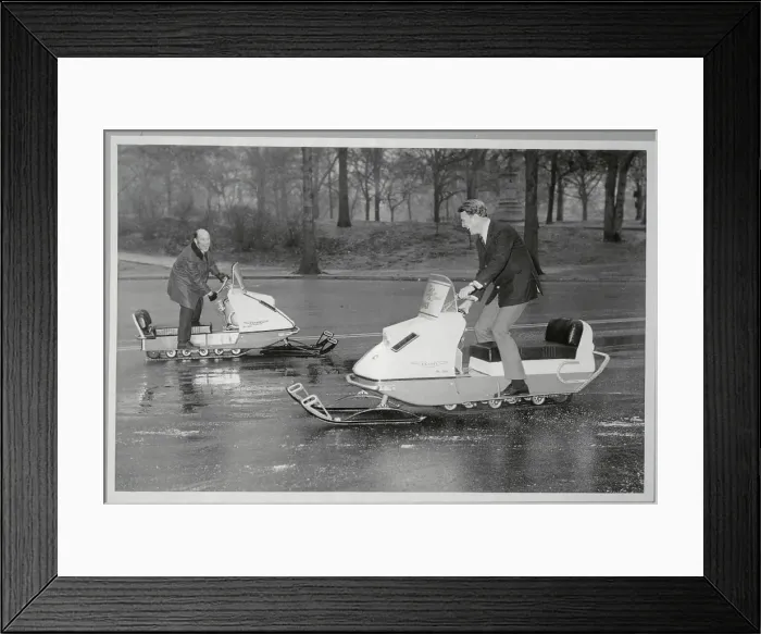 Framed Print : Race Car Drivers Riding Snowmobiles Framed Print : Race Car Drivers Riding Snowmobiles