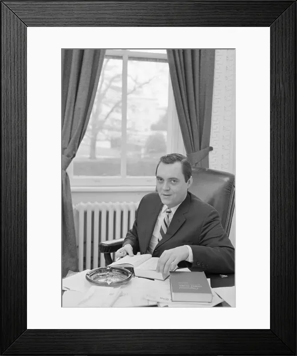 Framed Print : John P. Sears with Ashtray and Book at His Desk