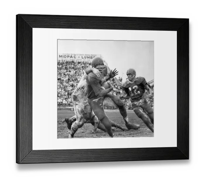 Framed Print : O.J. Simpson Tackled on Muddy Field Framed Print : O.J. Simpson Tackled on Muddy Field