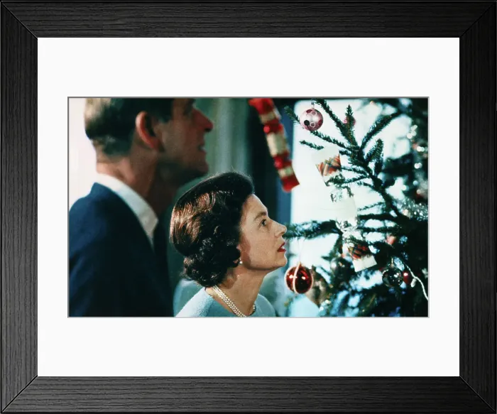 Framed Print : Queen Elizabeth and Prince Philip Looking at Christmas Tree Framed Print : Queen Elizabeth and Prince Philip Looking at Christmas Tree