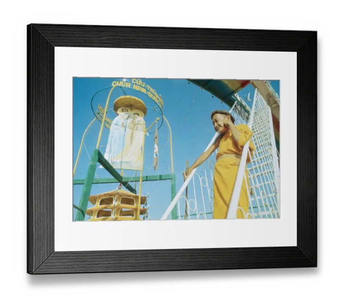 Framed Print : Nguyen Thanh Nam Stands On Stairs At The Entrance To Temple On Island Framed Print : Nguyen Thanh Nam Stands On Stairs At The Entrance To Temple On Island