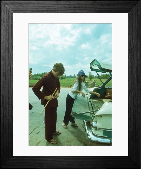 Framed Print : John Steinbeck IV And Chrystal Eastin Change Into Robes