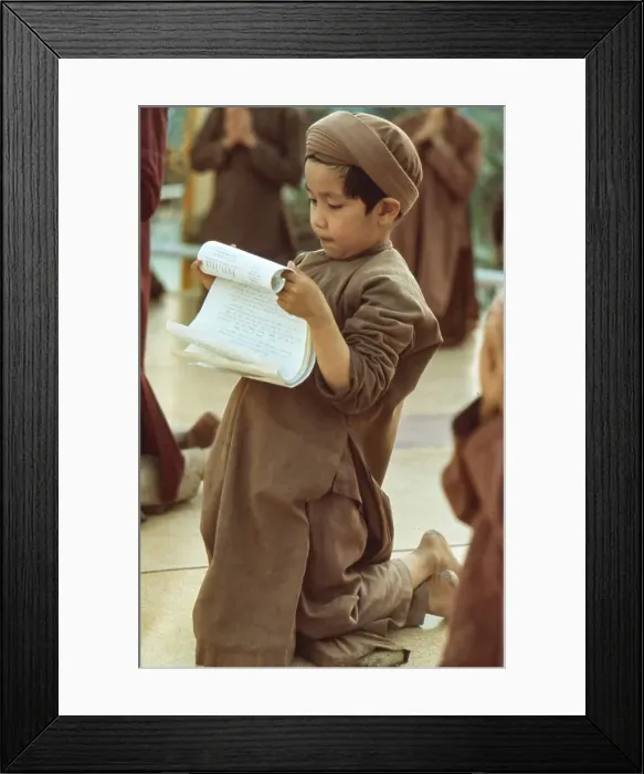 Framed Print : Child Reading Prayers Framed Print : Child Reading Prayers