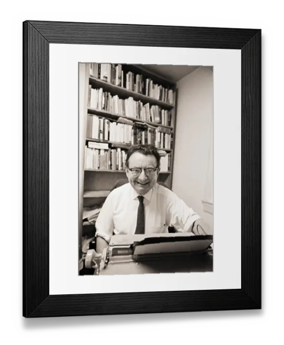 Framed Print : I.F. Stone Seated at Desk