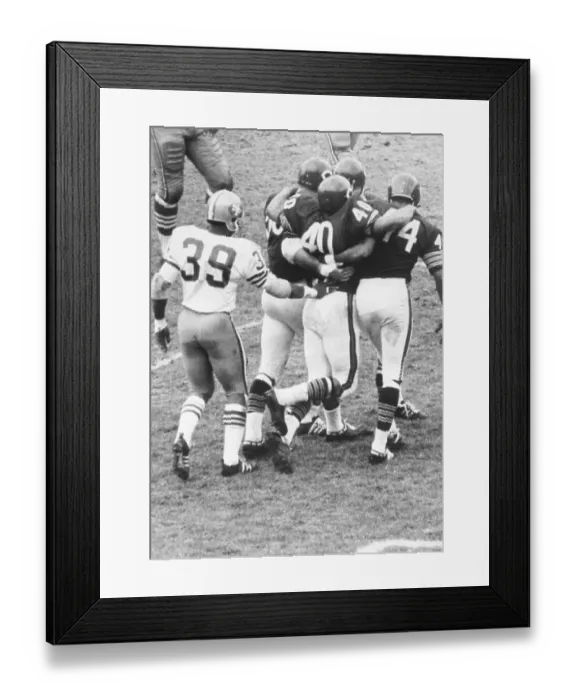 Framed Print : Chicago's Gale Sayers After Being Injured During a Game Against the 49ers Framed Print : Chicago's Gale Sayers After Being Injured During a Game Against the 49ers