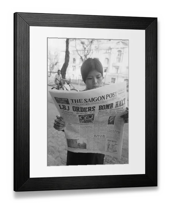 Framed Print : Woman Reads Headline Bombing Is Halted Framed Print : Woman Reads Headline Bombing Is Halted