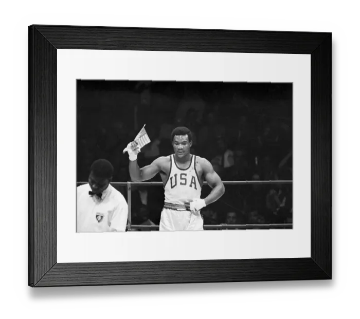 Framed Print : George Foreman Waves US Flag at Olympic Games Framed Print : George Foreman Waves US Flag at Olympic Games