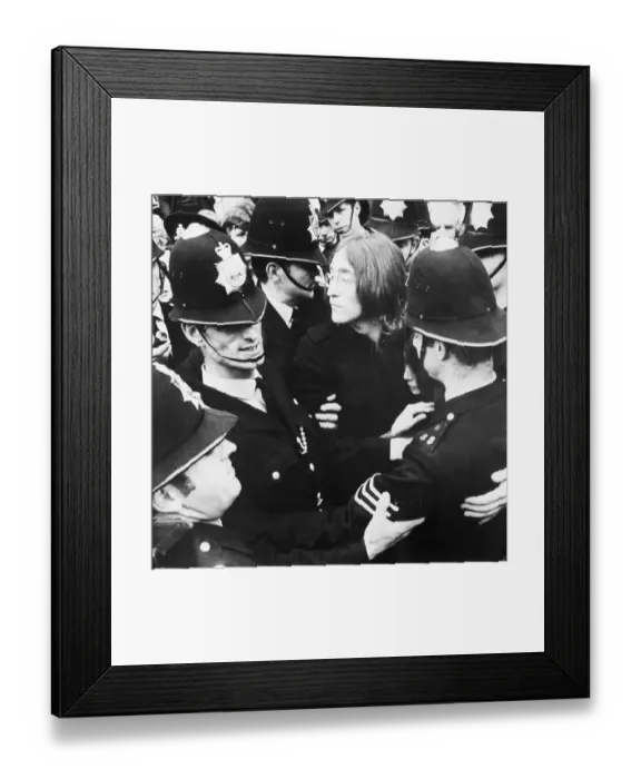Framed Print : Police Surrounding John Lennon and Yoko Ono Framed Print : Police Surrounding John Lennon and Yoko Ono